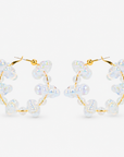 Alana Cloud Bubble Hoops featuring clusters of translucent iridescent bubbles around a gold hoop silhouette.