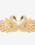 Anastasia statement bracelet featuring graceful gold swans, shimmering crystal details, sculptural pearl wings, and glossy pearl beads.