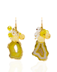 Yellow agate slice statement earrings featuring marbled lemon beads, faceted accents, gold trim, and dangling citrus-inspired details by Sassy Jones.