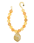 Yellow and cream marbled statement necklace featuring oversized citrus-toned beads and a natural agate pendant with gold trim by Sassy Jones.