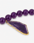 Chrysallis Purple Agate Druzy statement necklace featuring oversized polished agate beads and a one of a kind druzy agate centerpiece.