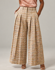 The Claire Tweed Wide-Leg Trouser featuring textured multicolor tweed, front pleats, and a high-rise waist.