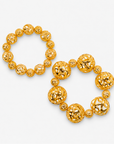 Dina Gold Openwork Sculptural Sphere 2 Piece Stretch Bracelet Stack featuring oversized and petite gold globes.