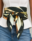 Neutral animal print statement scarf featuring a combination of classic leopard patterns and abstract artistic detailing.