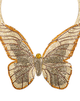 Gold butterfly statement bib necklace with champagne and clear crystals in a radiant oversized design.