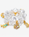 Sassy Jones Harbor Grace pearl bracelet stack featuring seahorse, anchor and tropical fish charms.