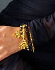 Sip, Sparkle & Slay Set featuring a black crystal sparkle tumbler, Maverick lip liner, Ibiza black crystal elephant stud earrings, and Ibiza black and gold bracelet stack.