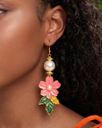 Kalani hand painted floral pearl dangle earrings featuring coral pink flowers, green and golden leaves, luminous pearls and gold tone detailing.