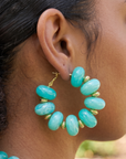 Kamaria Riviera Teal statement necklace with two layered strands of vibrant turquoise and mixed dimensional beads.