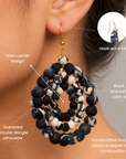 Sassy Jones Kenza dangle earrings featuring concentric circles of black, ivory and patterned cloth beads.