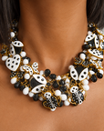 Lovebug Black and White statement necklace featuring spotted hearts, butterflies, ladybugs and layered beadwork.