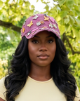 Pink distressed denim ballcap featuring removable butterfly, ladybug, heart, and floral crystal brooch pins by Sassy Jones.