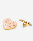 On model view of Lovebug Cream Heart Stud Earring featuring a glossy marbled finish and scattered crystals.