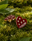 Crimson heart-shaped stud earrings with crystal accents and 18K gold-plated trim from the Lovebug collection