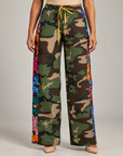 Milan Camo Sequin Wide Legged Track Pant featuring camouflage print and multicolor sequin side panels.