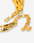 Close-up of Miss Beasley Crystallique Necklace showing the fish hook gold tone finish with the pastel beetle accents.