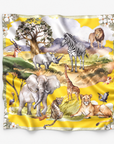 1. Samba Serengeti Oversized Square Scarf featuring African safari animals against a vibrant golden yellow landscape.
