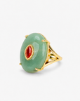 Jade statement ring featuring a large polished green stone and petite contrasting centerpiece with Gold tone finish.