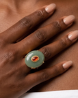 Sassy Jones Samira Jade ring featuring an oversized natural stone silhouette with a small warm toned center detail.