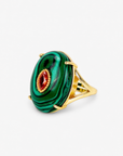 Green statement ring featuring dark malachite inspired stripes, contrasting center stone and Gold tone finish.