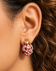 Close up of Scarlette Dainty Pearl Stud showing a jeweled red ladybug with pearl covered wings and crystal tipped antennae.