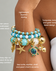 Three piece coastal bracelet stack featuring aqua beads, gold accents, and sea turtle, starfish, and shell charms.