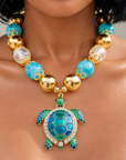 Soleia Sea Turtle Chunky Chain featuring oversized turquoise and gold beads with a jeweled sea turtle pendant.