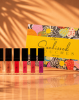 Summer Garden Beauty Bundle featuring complimentary Sunkissed Smooches Gloss Gift Set, Mojave Palette, and Merlot Lip Liner with Summer Garden Suit purchase by Sassy Jones.