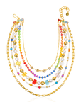Colorful layered pearl and teddy bear necklace paired with a glittering rose gold lipstick clutch featuring three exclusive pink lipstick shades by Sassy Jones.
