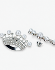 Sassy Jones Pearl Queen earrings featuring ornate silver finish crowns topped with luminous white pearls.