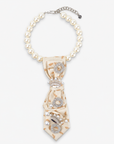 Valerie Vintage Necktie Pearl Queen featuring an ivory fabric tie, pearl style necklace and sparkling jeweled embellishments.