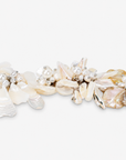 Mother of Pearl floral statement bracelet with luminous shell petals and dimensional pearl clusters.