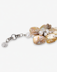 Sassy Jones Wisteria bracelet featuring handcrafted ivory shell flowers with freshwater cultured pearl details.