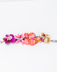 Wisteria Semi Precious Bracelet in Pink and Orange Abalone featuring handcrafted shell flowers with freshwater cultured pearl accents.