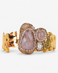 Zahara Adjustable Cuff in Rose featuring oversized dusty pink stones surrounded by sparkling crystal accents.