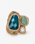 Zahara Sparkle Ring in Green featuring a deep green centerpiece with soft green stones, pearl and crystal accents.
