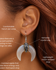 Sassy Jones Zuma dangle earrings featuring sculptural crescent shaped shell drops with sparkling centers.