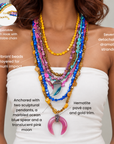 Sassy Jones Zuma necklace featuring multiple hand strung shell bead layers with crystal embellished accents.