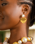 Amora Pearl Heart Dangles – Ivory/Gold with pearl studs and gold heart drops.