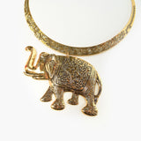 Babar Brass Bib - Bronze elephant choker Statement jewelry Elephant necklace Exotic necklace Intricately designed jewelry Unique choker necklace Detailed elephant pendant Bold jewelry piece Fashion statement necklace Artistic jewelry design Contemporary and traditional fusion Special occasion necklace Everyday wear jewelry Sophisticated jewelry Elegant bronze choker