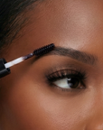 Juneteenth promotional gift bundle featuring a red and white Sassy City Tote, Cherry Jazzy Lip Liner, Black Brow Genius Pencil, and Anxiety Card Stack by Sassy Jones.