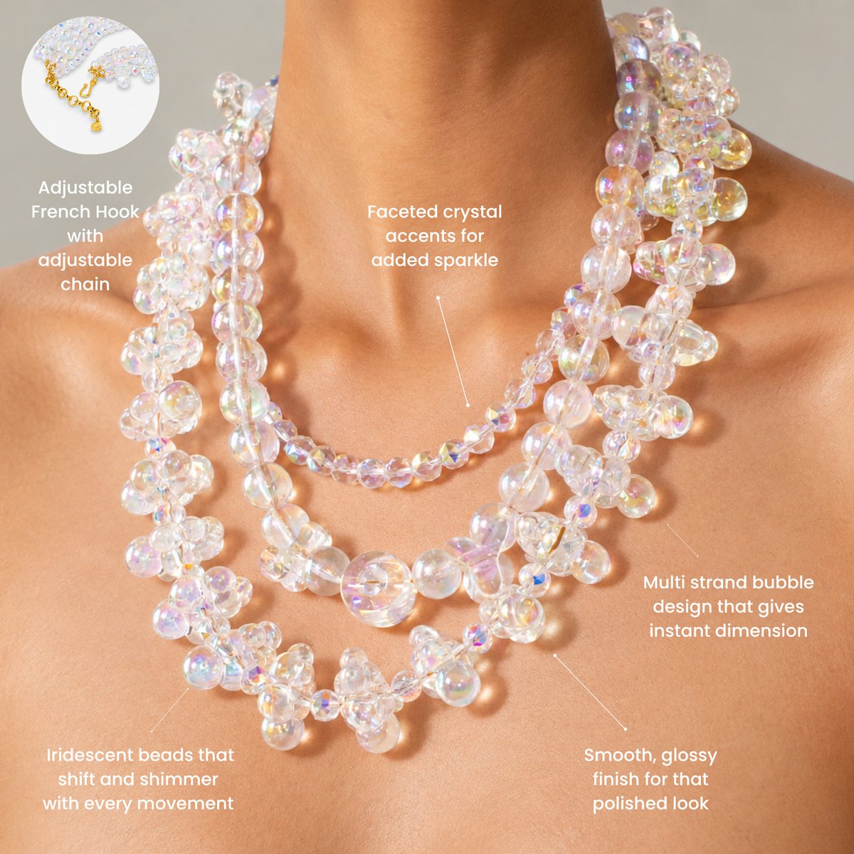 Woman wearing the Alana Cloud statement necklace with clustered iridescent bubbles and a faceted beaded strand.