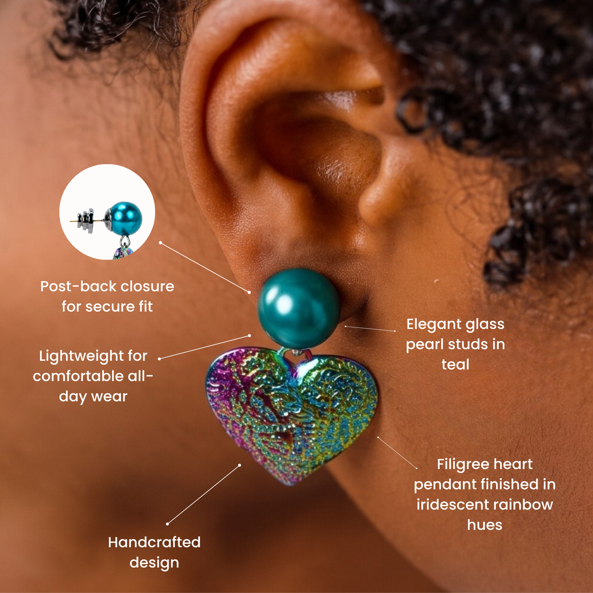 Rainbow heart dangle earring featuring a deep teal glass pearl top and multicolor iridescent finish.