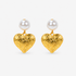 Amora Pearl Heart Dangles in Ivory and Gold featuring oversized pearl tops and embossed gold heart pendants.