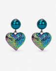 Amora Pearl Heart Dangles in Rainbow Teal featuring glossy teal glass pearl studs and iridescent heart drops.