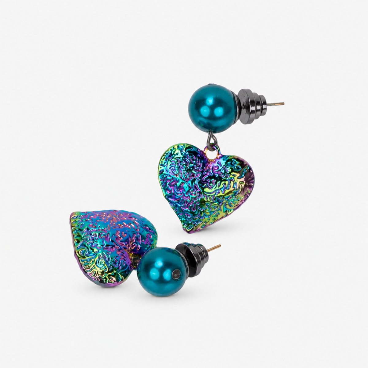 On model view of Amora Rainbow Teal earring with oversized teal pearl stud and colorful textured heart pendant.