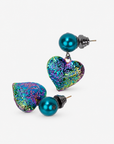 On model view of Amora Rainbow Teal earring with oversized teal pearl stud and colorful textured heart pendant.