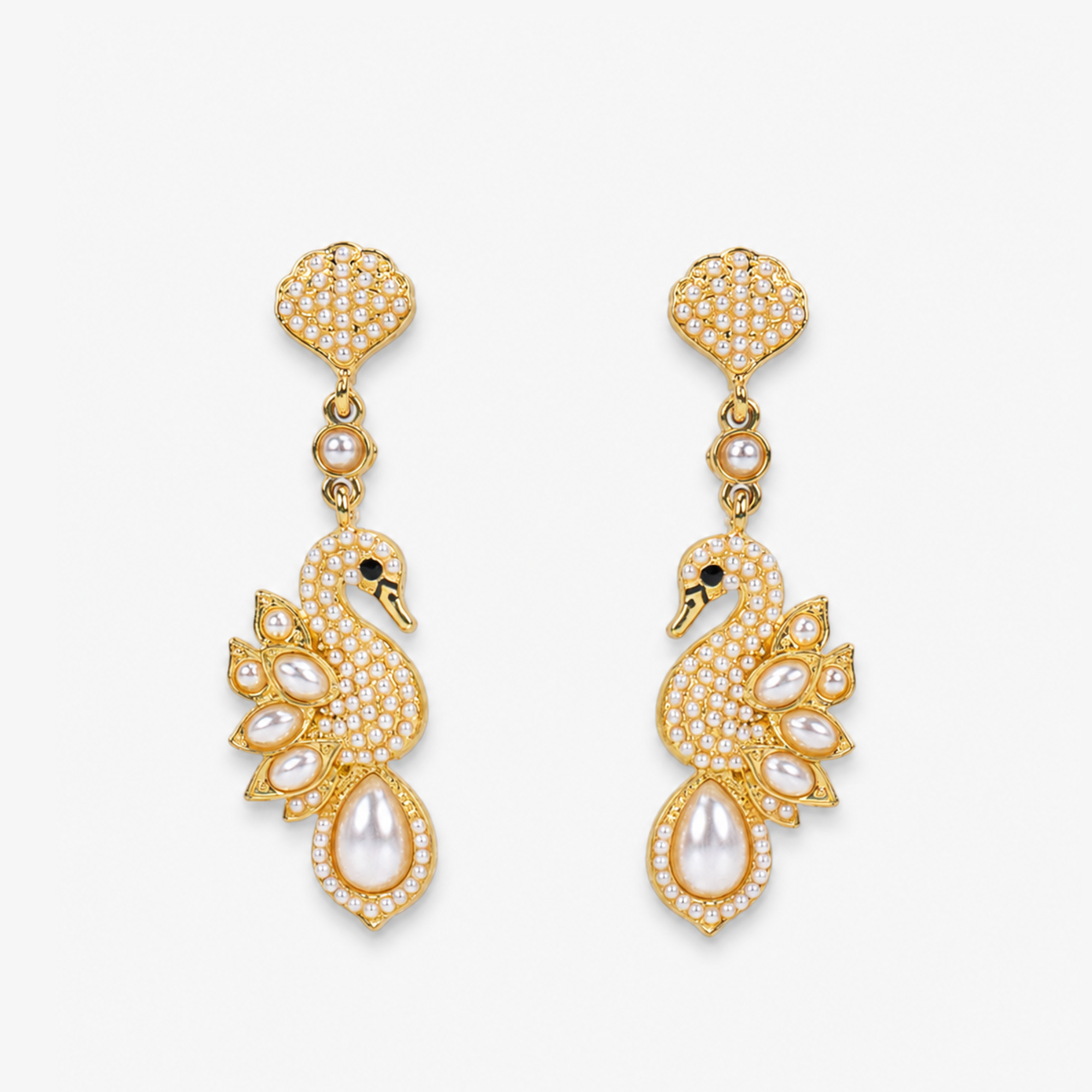 Anastasia Swan Earrings featuring gold tone swans embellished with sparkling crystals, ivory pearl wings, and teardrop pearl accents.