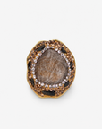 Armana Statement Ring in Black featuring an organic black stone centerpiece with crystal accents.