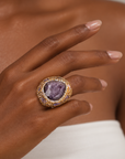Sassy Jones Armana Purple ring featuring a deep purple stone centerpiece in a dimensional embellished setting.